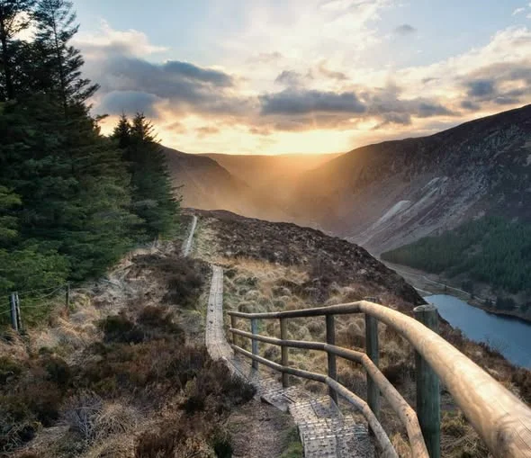 Walker on the Spinc ridge above Glendalough, County Wicklow